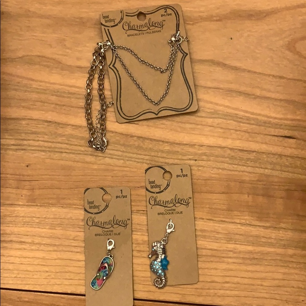 2 bracelets with 2 charms.